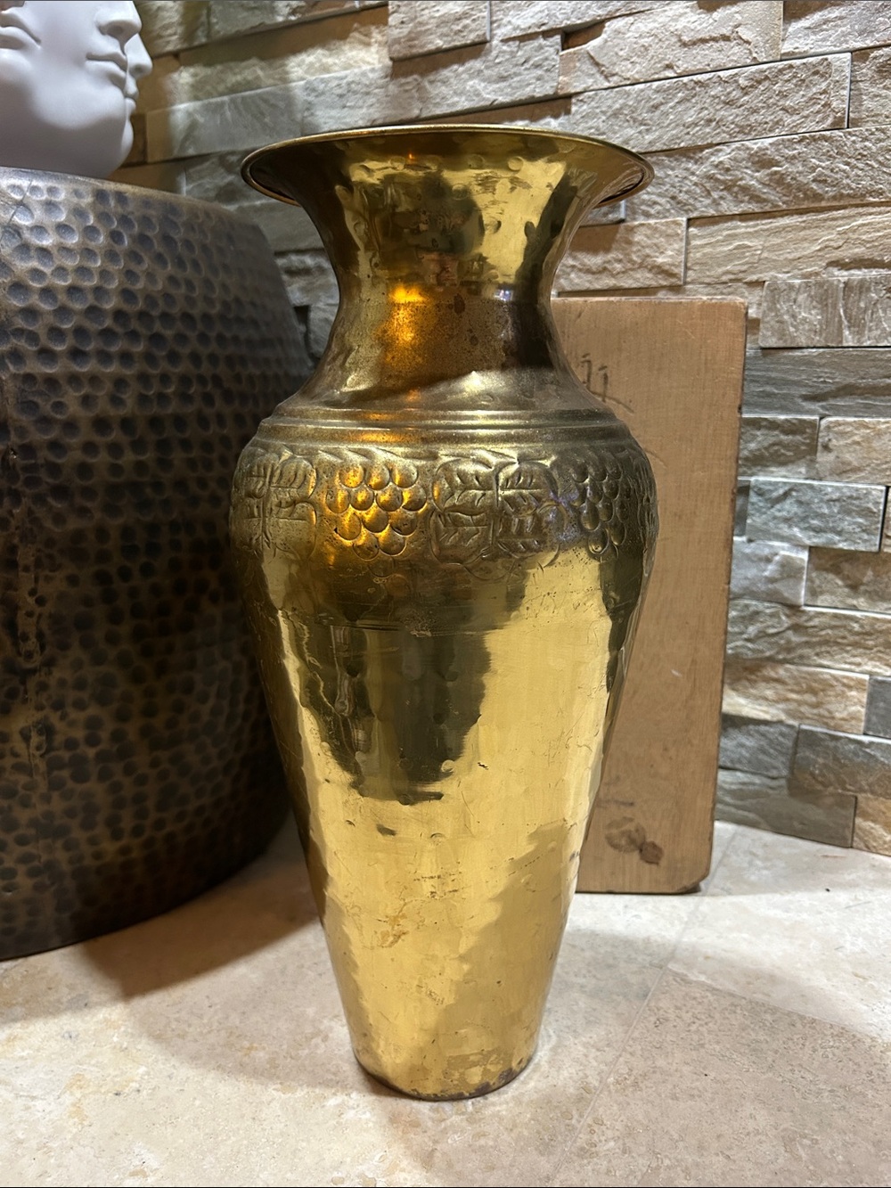 vintage hammered and embossed brass vase with grape design